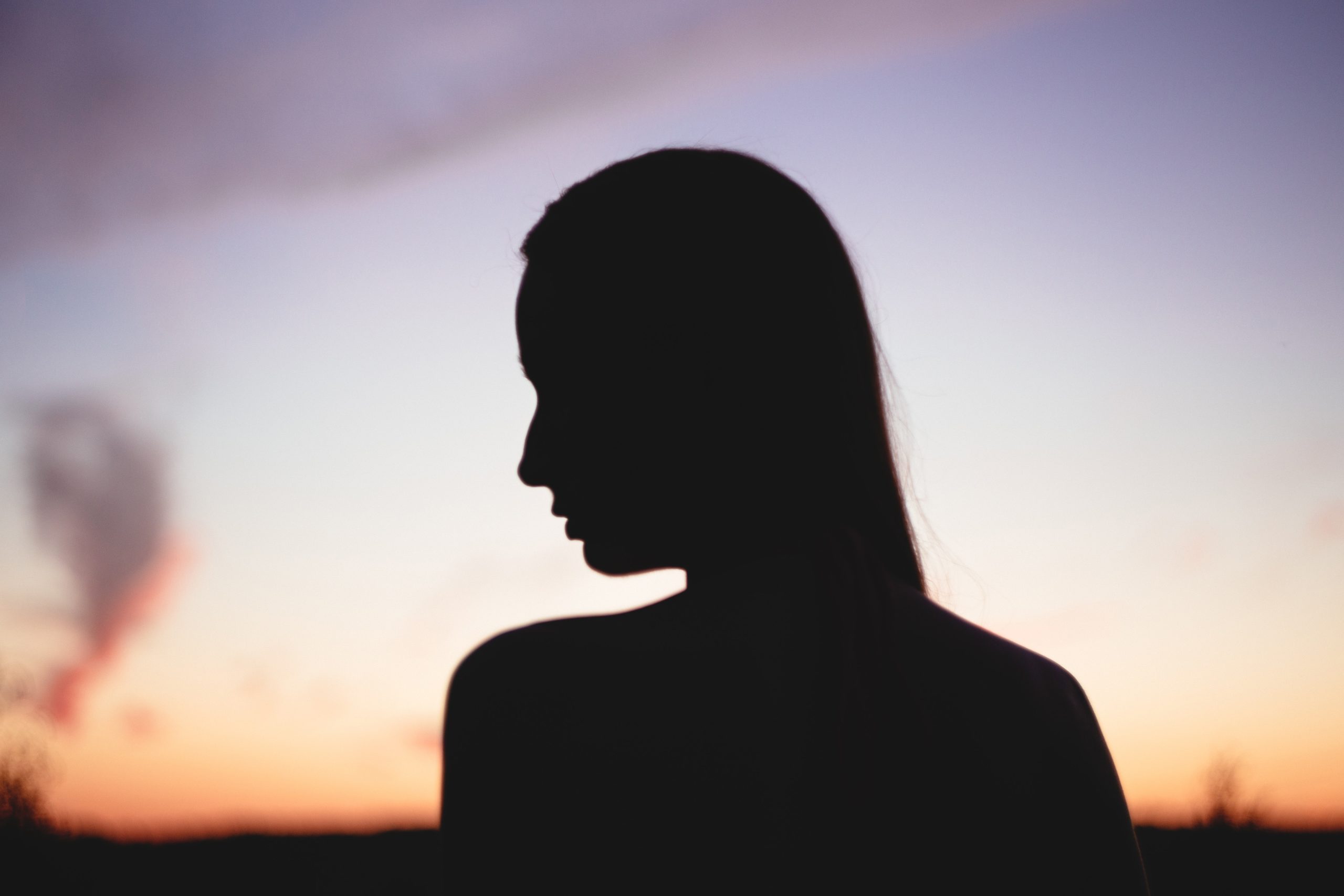 silhouette-of-woman-during-sunset-194446 Woman